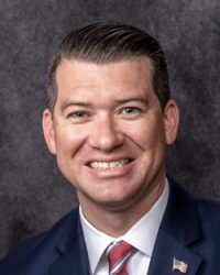 Brandon E. Umba