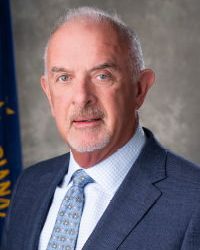 Travis  Holdman