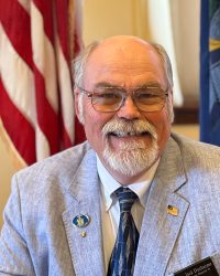 John E. Ducharme